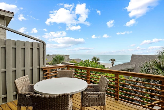 4365 S Atlantic Ave Unit B8, New Smyrna Beach, FL 32169 - wooden terrace featuring a water view and outdoor dining area