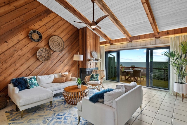 4365 S Atlantic Ave Unit B8, New Smyrna Beach, FL 32169 - living area featuring light tile patterned floors, wooden walls, wooden ceiling, and a water view