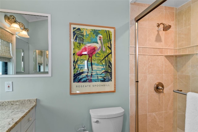 4365 S Atlantic Ave Unit B8, New Smyrna Beach, FL 32169 - bathroom with toilet, vanity, and a shower stall