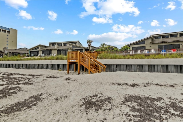 4365 S Atlantic Ave Unit B8, New Smyrna Beach, FL 32169 - view of playground with stairs and a residential view