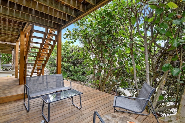4365 S Atlantic Ave Unit B8, New Smyrna Beach, FL 32169 - wooden deck featuring stairway
