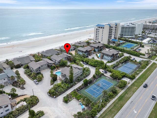 4365 S Atlantic Ave Unit B8, New Smyrna Beach, FL 32169 - bird's eye view of waterfront with a beach