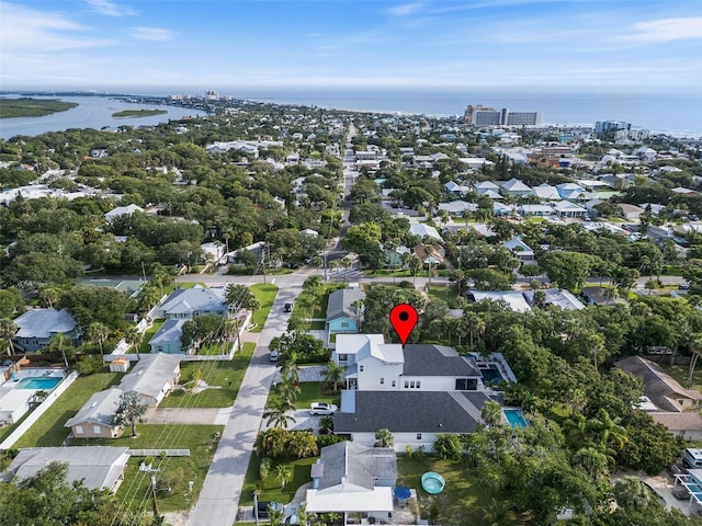 507 S Pine St, New Smyrna Beach, FL 32169 - view of property location with a nearby body of water, nearby suburban area, and a pool area
