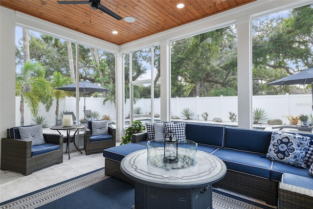 507 S Pine St, New Smyrna Beach, FL 32169 - sunroom featuring an outdoor living space and a ceiling fan