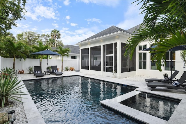 507 S Pine St, New Smyrna Beach, FL 32169 - view of swimming pool with a sunroom and a patio area