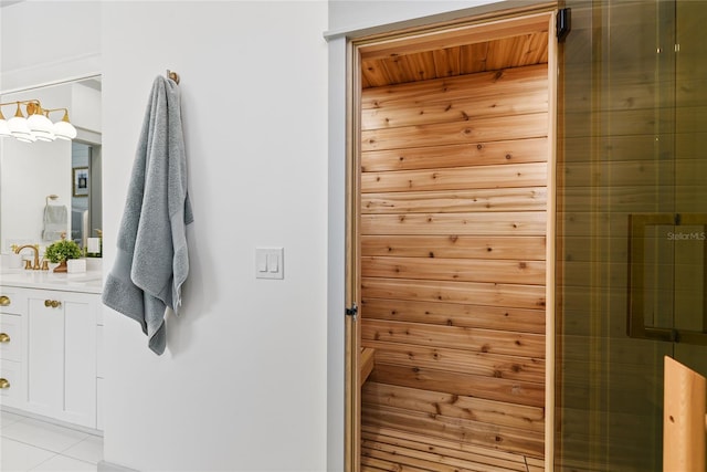 507 S Pine St, New Smyrna Beach, FL 32169 - bathroom featuring vanity, tile patterned flooring, and a relaxing sauna