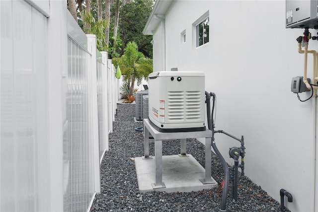507 S Pine St, New Smyrna Beach, FL 32169 - exterior view of a power unit, stucco siding, and cooling unit