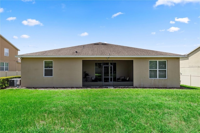 1431 Leitrim Loop, Apopka, FL 32703 - rear view of property featuring stucco siding, central AC, and roof with shingles