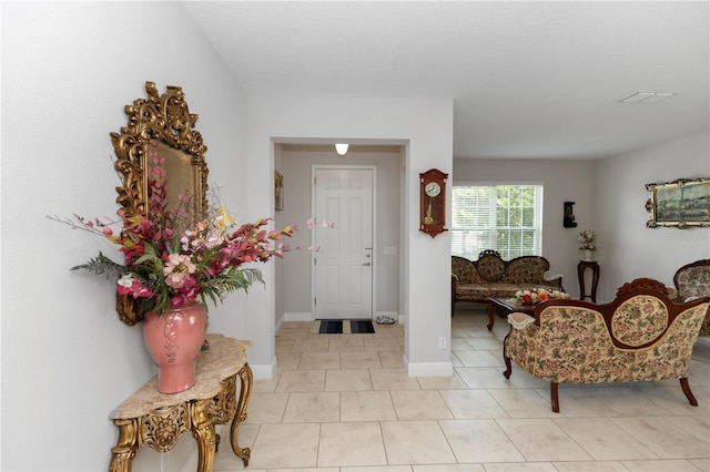 1431 Leitrim Loop, Apopka, FL 32703 - entrance foyer featuring light tile patterned floors and baseboards