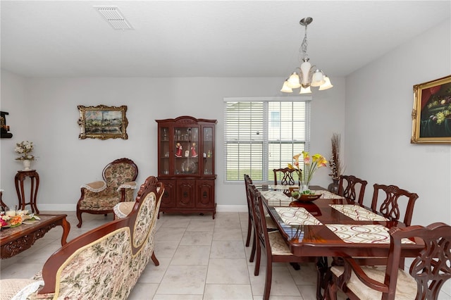 1431 Leitrim Loop, Apopka, FL 32703 - dining space featuring a chandelier, baseboards, and light tile patterned floors