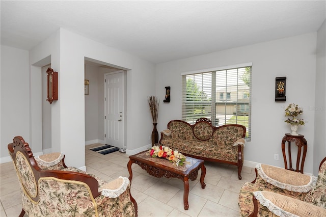 1431 Leitrim Loop, Apopka, FL 32703 - living room with light tile patterned floors and baseboards