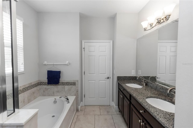 1431 Leitrim Loop, Apopka, FL 32703 - full bath with healthy amount of natural light, a bath, double vanity, and tile patterned floors