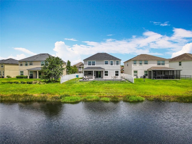 4993 Southlawn Ave, Orlando, FL 32811 - back of property featuring a water view, a sunroom, stucco siding, and a residential view