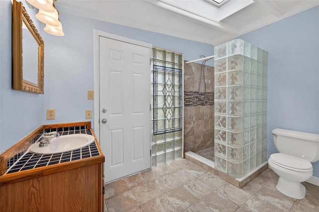 3637 Dubsdread Cir, Orlando, FL 32804 - bathroom featuring walk in shower, vanity, toilet, and a skylight