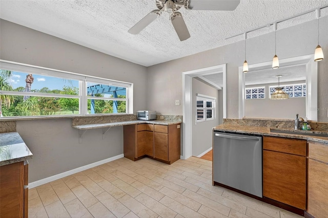 3637 Dubsdread Cir, Orlando, FL 32804 - kitchen featuring stainless steel dishwasher, brown cabinets, a sink, ceiling fan, and a textured ceiling