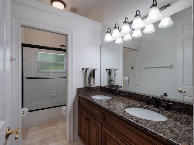 2106 Ridgewind Way, Windermere, FL 34786 - bathroom with double vanity and bath / shower combo with glass door