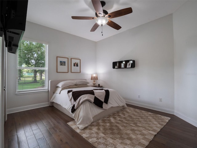 2106 Ridgewind Way, Windermere, FL 34786 - bedroom featuring dark wood-style flooring and ceiling fan
