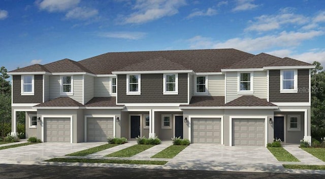 134 River Front Way, Edgewater, FL 32141 - multi unit property with an attached garage, driveway, stucco siding, and a shingled roof