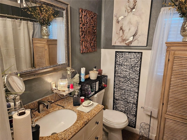 3910 Orange Ave, Coleman, FL 33521 - bathroom with vanity and toilet