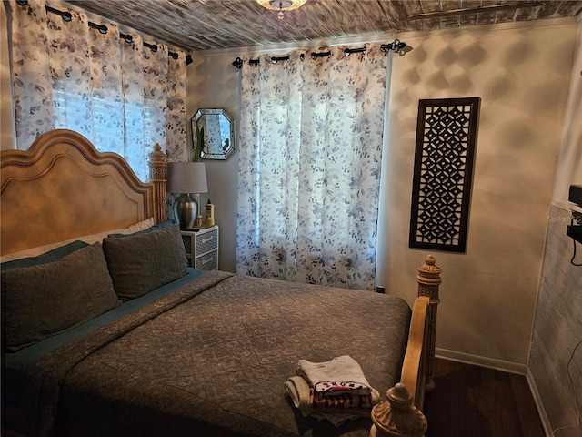 3910 Orange Ave, Coleman, FL 33521 - bedroom with wood finished floors and baseboards