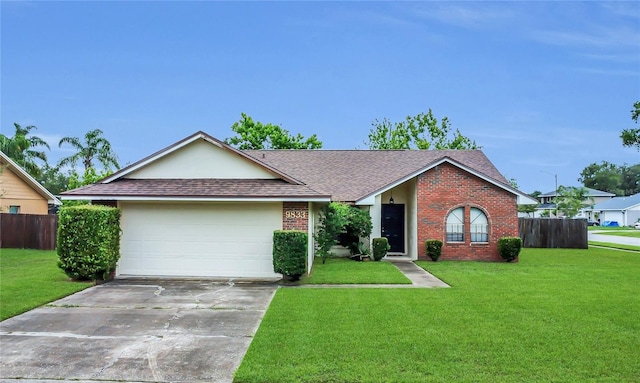 9833 Tattersall Ave, Orlando, FL 32817 - ranch-style house with brick siding, roof with shingles, driveway, and a garage