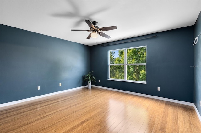 15324 Black Lion Way, Winter Garden, FL 34787 - spare room with a ceiling fan, baseboards, and wood finished floors