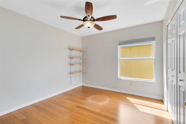 15324 Black Lion Way, Winter Garden, FL 34787 - empty room featuring light wood-type flooring, a ceiling fan, and baseboards