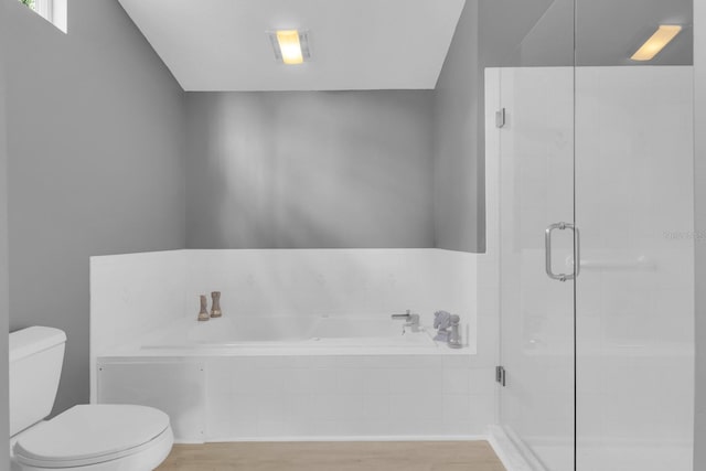 625 Nighthawk Cir, Winter Springs, FL 32708 - bathroom featuring toilet, a bath, a shower stall, and wood finished floors