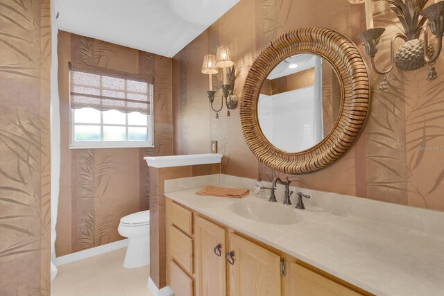 625 Nighthawk Cir, Winter Springs, FL 32708 - bathroom featuring toilet, vanity, baseboards, and tile patterned floors
