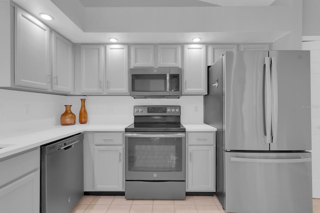 625 Nighthawk Cir, Winter Springs, FL 32708 - kitchen featuring stainless steel appliances, light countertops, and light tile patterned flooring