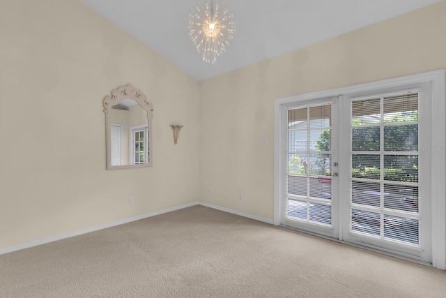 625 Nighthawk Cir, Winter Springs, FL 32708 - carpeted empty room with a chandelier, baseboards, and vaulted ceiling