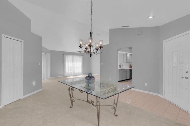 625 Nighthawk Cir, Winter Springs, FL 32708 - dining space featuring a chandelier, high vaulted ceiling, baseboards, and light colored carpet