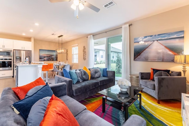 7951 Haverhill Way, Kissimmee, FL 34747 - living area with ceiling fan