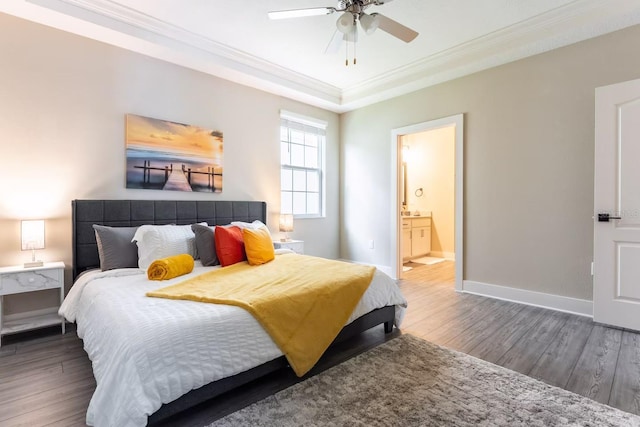 7951 Haverhill Way, Kissimmee, FL 34747 - bedroom featuring ornamental molding, wood finished floors, baseboards, ensuite bathroom, and a ceiling fan