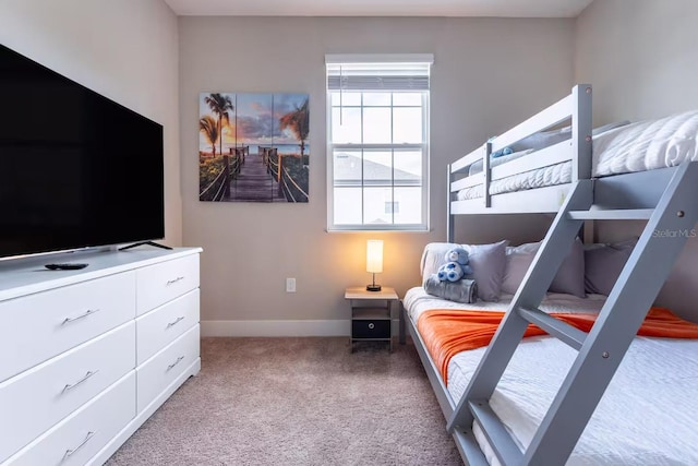 7951 Haverhill Way, Kissimmee, FL 34747 - carpeted bedroom featuring baseboards