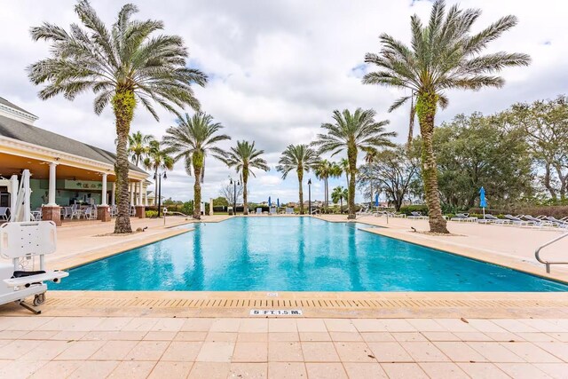 7951 Haverhill Way, Kissimmee, FL 34747 - community pool with a patio area
