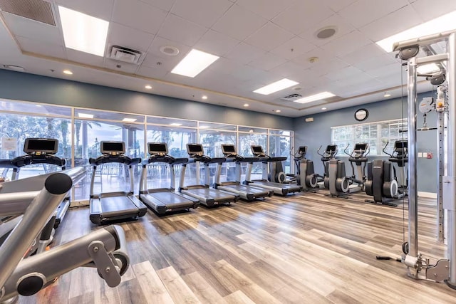 7951 Haverhill Way, Kissimmee, FL 34747 - gym featuring wood finished floors and a drop ceiling