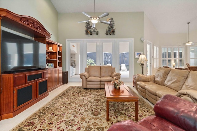 618 Manatee Bay Dr, Cape Canaveral, FL 32920 - living area featuring ceiling fan, a towering ceiling, and light tile patterned flooring