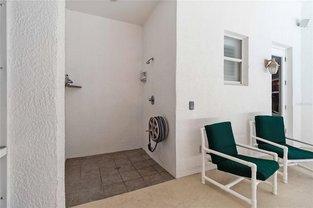 618 Manatee Bay Dr, Cape Canaveral, FL 32920 - view of exterior entry featuring stucco siding