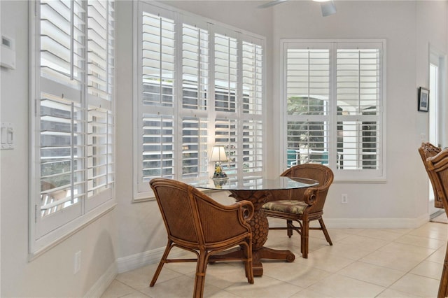 618 Manatee Bay Dr, Cape Canaveral, FL 32920 - dining space with plenty of natural light, tile patterned floors, and ceiling fan