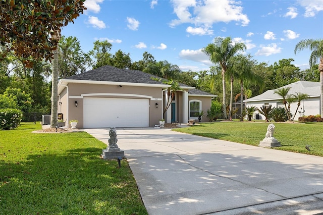 1907 Sir Lancelot Cir, Saint Cloud, FL 34772 - view of front facade featuring stucco siding, a garage, concrete driveway, and a front lawn