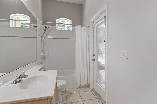 1907 Sir Lancelot Cir, Saint Cloud, FL 34772 - bathroom featuring toilet, vanity, shower / tub combo, and tile patterned floors