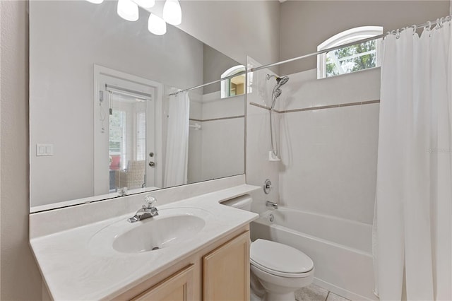 1907 Sir Lancelot Cir, Saint Cloud, FL 34772 - full bath featuring vanity, toilet, shower / bath combo, and healthy amount of natural light