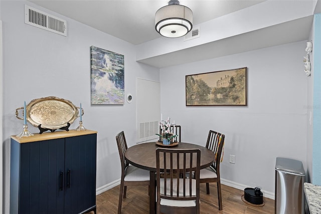 3028 Parkway Blvd Unit 308, Kissimmee, FL 34747 - dining area with baseboards and wood finished floors