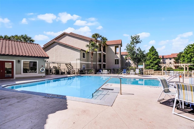 3028 Parkway Blvd Unit 308, Kissimmee, FL 34747 - community pool featuring a patio