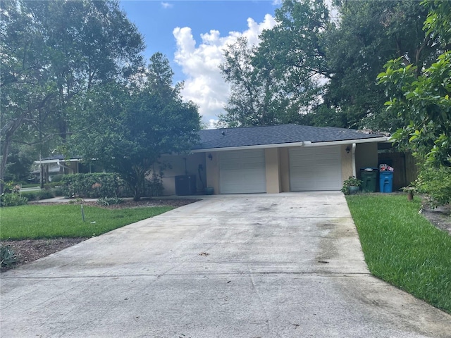955 Gamewell Ave, Maitland, FL 32751 - ranch-style home featuring an attached garage, concrete driveway, a front yard, and stucco siding