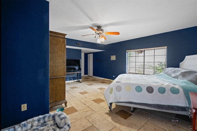 4420 Conway Gardens Rd, Orlando, FL 32806 - bedroom featuring stone tile floors, baseboards, and ceiling fan