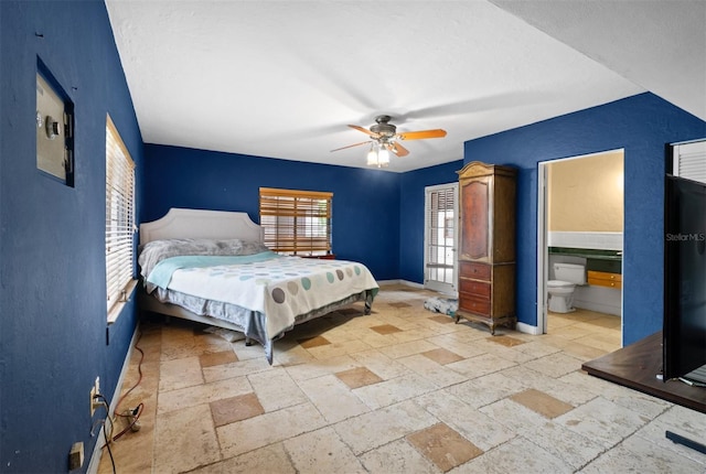 4420 Conway Gardens Rd, Orlando, FL 32806 - bedroom featuring stone tile flooring, baseboards, and ceiling fan