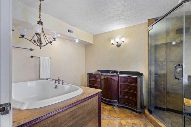 4420 Conway Gardens Rd, Orlando, FL 32806 - bathroom with a textured ceiling, a bath, a shower stall, vanity, and a chandelier
