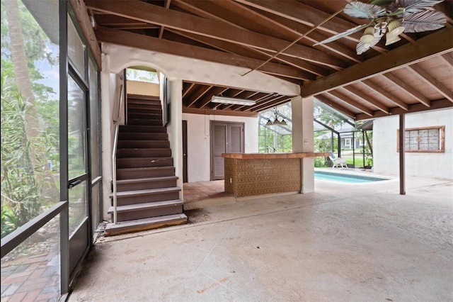 4420 Conway Gardens Rd, Orlando, FL 32806 - view of patio featuring ceiling fan, stairs, and an outdoor pool
